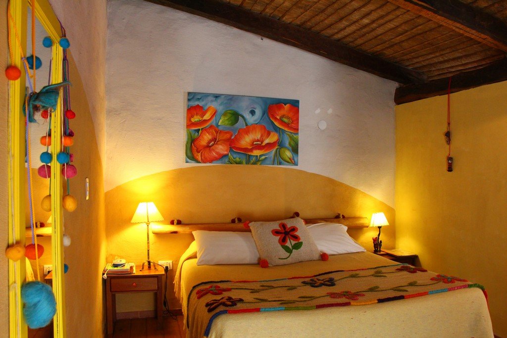 Habitación con cama king Suite Geode en Posada Inti Watana, alojamiento en Tafí del Valle con
calefacción y ropa blanca